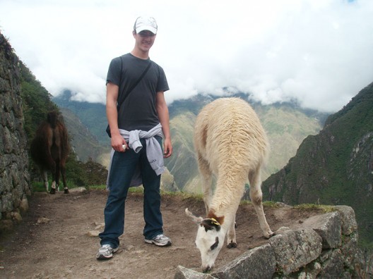 Student with llama, Machu Picchu, Peru Student with llama, Machu Picchu, Peru