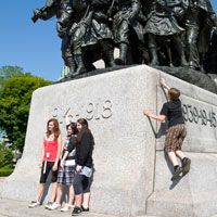 Ottawa Essentials Four Day Spring Tour | Students at Ottawa Statue